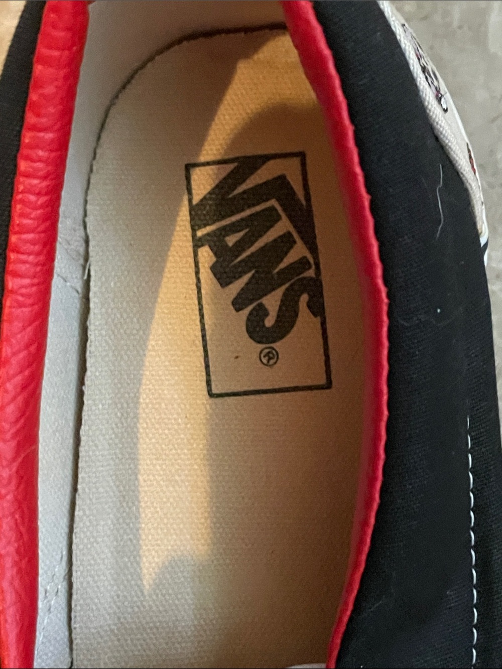 Vans Slip-On Loafers in White, Black, and Red with Skull Print - Picture 10 of 15
